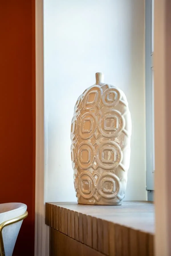 A carved ceramic