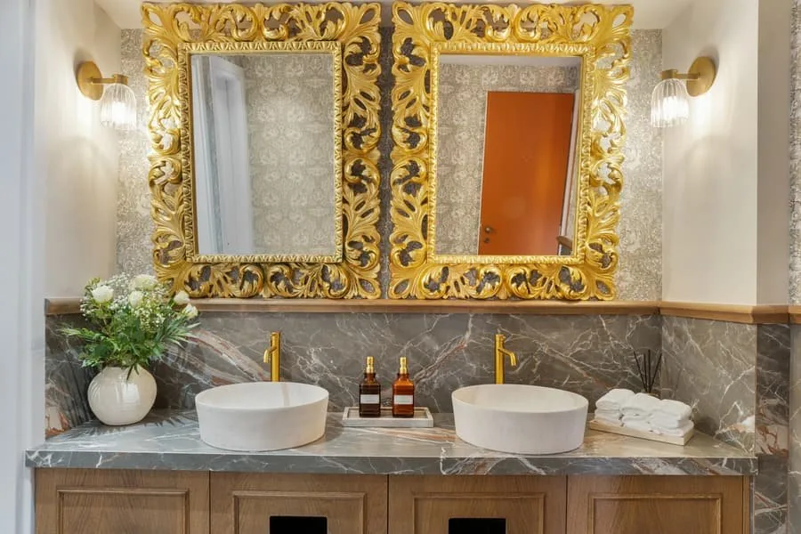 Twin gilded mirrors